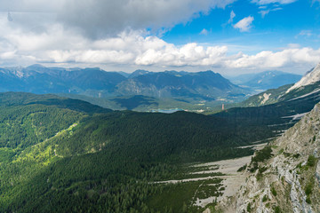 Fototapeta na wymiar Beautiful hike and climb to the Zugspitze near Ehrwald and Eibsee, the highest mountain in Germany