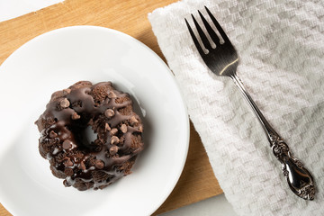 Small Chocolate Bunt cake with a fork.