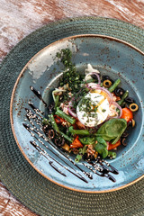 Obraz na płótnie Canvas Asparagus, cherry and egg salad. Serving in restaurant.