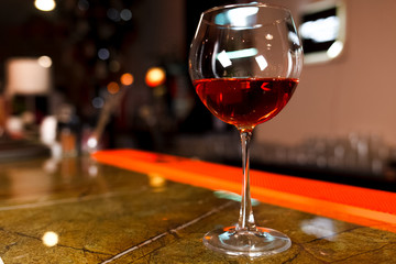 Glass of wine at the bar