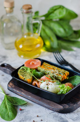 Healthy food and diet concept, restaurant dish delivery. Take away of fitness meal. Weight loss nutrition in boxes. Healthy lunch - fish, poached egg and carrot cake.