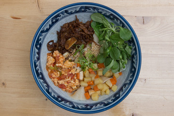 Fried rice noodles with lamb