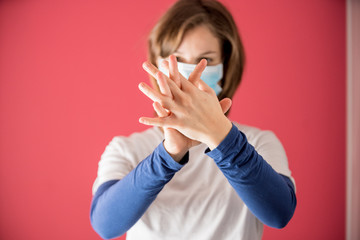 nurse with surgical mask shows how to properly wash your hands with gel or soap to prevent coronavirus infections and avoid the spread of the world pandemic started in china