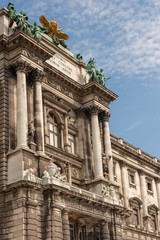 Obraz premium Imperial Hofburg Palace portal with columns and sculptures in Vienna, Austria