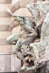 Exquisite detail of Power at Sea fountain on Michaelerplatz by the Hofburg Palace in Inner City, Vienna, Austria
