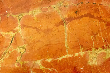 Red, orange and yellow marble texture. Stone background seamless pattern