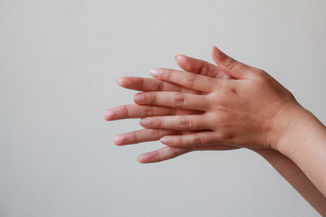 Close up woman wash hands. sanitizer gel dispenser, against  coronavirus or Covid-19 virus and other viruses.