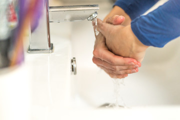 nurse shows how to properly wash your hands with soap to prevent coronavirus infections and prevent the spread of the world pandemic