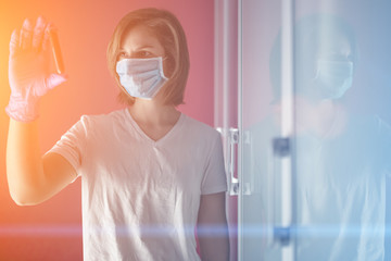 nurse wearing a mask, analyzes test tube of blood infected by coronavirus, generated in china, widespread in Italy and also arrived in the us with the risk of a 2019-ncov flu pandemic and deaths 