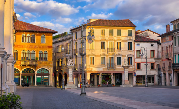 Fototapeta Bassano del grappa Italy. Square freedom. Landscape old town with italian architecture and street lamp. Sunrise at deserted street.