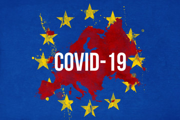 Obraz na płótnie Canvas EUROPEAN FLAG WITH THE NATIONS AFFECTED BY THE CORONAVIRUS EPIDEMY PAINTED WITH A BLOODY STYLE TO EMPHASIZE THE GRAVITY OF THE WORLD SITUATION AND THE TEXT COVID-19 ON IT