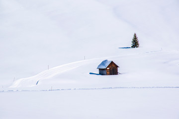 old hut in the snow two