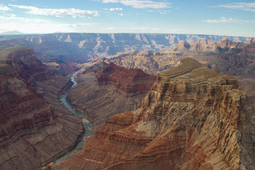 river cuts through the colorful canyon