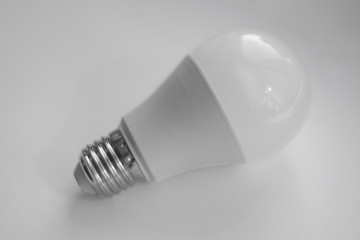 Isolated light bulb close up on white background