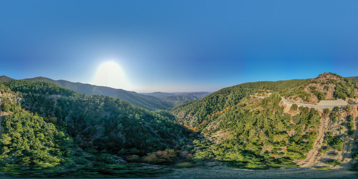 360 degree spherical panorama landscape of Cyprus mountains. Mountain road and colorful forest