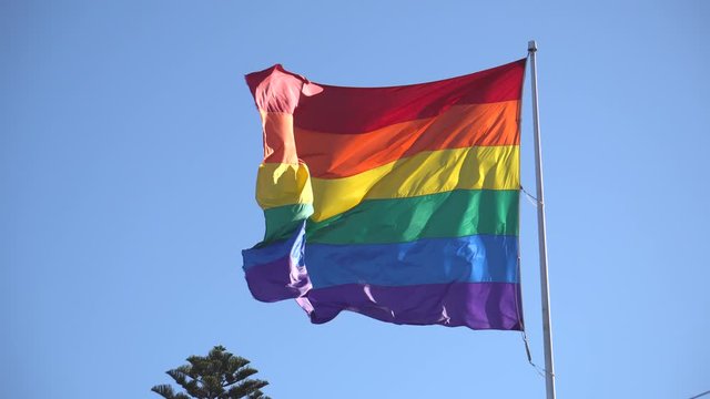 Waving LGBT pride flag or Rainbow pride flag - Footage from Castro District, San Francisco Californian in the United States