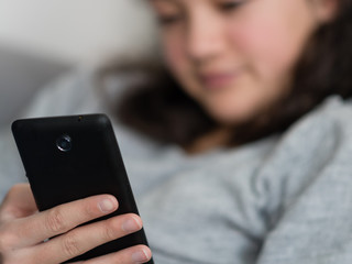 Young woman using smartphone