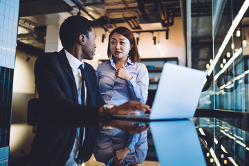 Businesswoman explaining idea to colleague