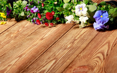 Gardening tools on vintage wooden table - spring. Spring flowers and garden tools on wooden table