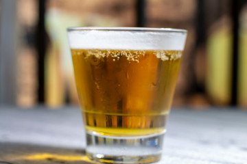 Glass of beer with background of a cellar
