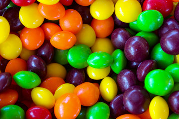 Fototapeta na wymiar Rainbow colored fruit candies