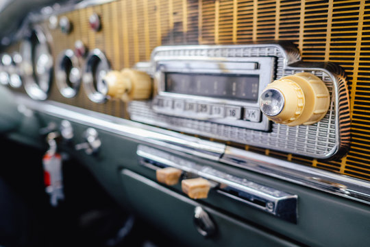 Old timer car radio dashboard close up