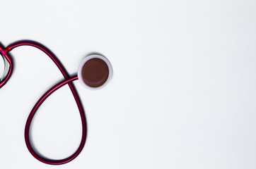 Stethoscope on a gray background. Device for listening to the lungs. Medical instruments. Place for your text. Medical background