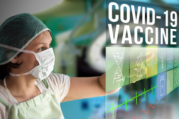 Coronavirus Covid-19 concept image with doctor woman using futuristic touch monitor interface with text and icons with surgery operating room on background looking for vaccine with mask on her face