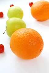 Apple and orange isolated on a white background
