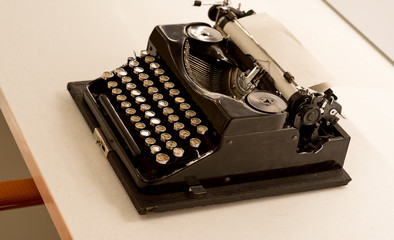 closeup of classic black typewriter, artistic writing concept
