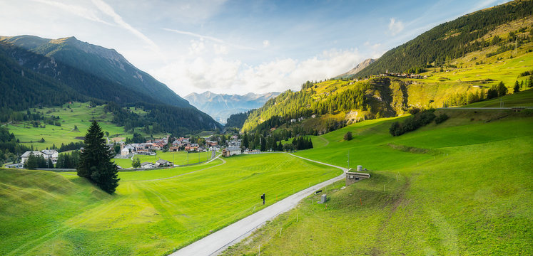 View of small Swiss village from Bernina Express which passes through the town of Privilasco (town in the Valposchiavo valley)