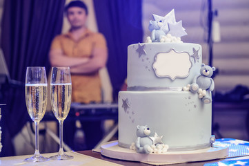 Little boy Party cake with sweet bears on the table.