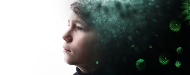 Fototapeta premium Double exposure of young crying boy with sad eyes and abstract virus strain model of MERS-Cov. Coronavirus 2019-nCov. Sick unhappy child. Healthcare, virus concept.
