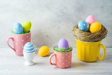 Easter holiday decorations with easter eggs on wooden table