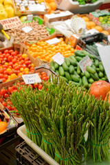 Fresh asparagus and another vegetables on farm market