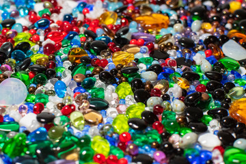 Colorful background made of different kinds of beads