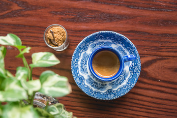 hot black espresso coffee on wooden table