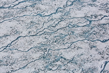 Surface of a flowing glacier. Aerial view. Arctic region