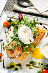 sandwich with salted salmon and poached egg