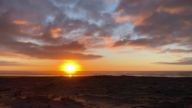 Colorful Sundown Sunset On Sandy Beach Time Lapse
