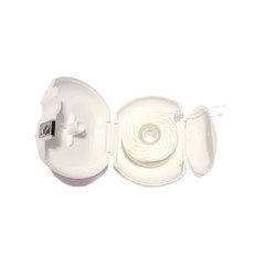Dental floss isolated on a white background. Professional dental floss for brushing your teeth. Dental floss for oral care. 