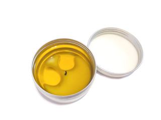 Jar with wax isolated on a white background. Body cream. Wax for hair removal. Depilation. Aromatic oil. Hygiene product. Body Oil. Hot cream. 