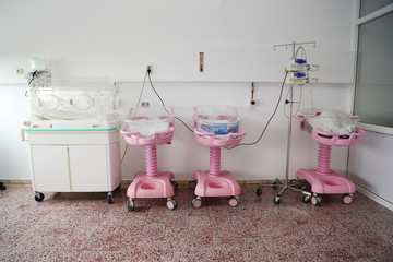 Newborn baby cribs in hospital nursery