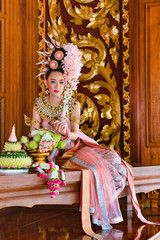 Fototapeta premium Portrait of Beautiful asian young woman,Thai girl in traditional thai costume, identity culture of Thailand.