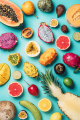 Tropical fruits concept. Exotic fruits - pineapple, papaya, mango, annona, banana, pitahaya, kiwano, african horned melon, tamarillo fruit, granadilla, salak, snake fruit, maracuya, rambutan, lychee