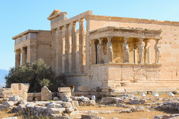 Fototapeta na wymiar Erechtheion with the Caryatids in Acropolis. Athens, Greece.