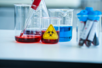 The COVID-19 virus infection deadly hazardous  outbreak tested in medical science laboratory in glassware in hospital with protective equipmen