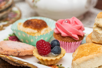 plate with delicious freshly baked cakes