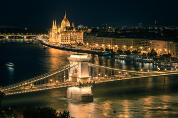 Fototapeta na wymiar Budapest panorama at sunset. Landmarks: The Parliament, the chain bridge and the Danube river, Hungary