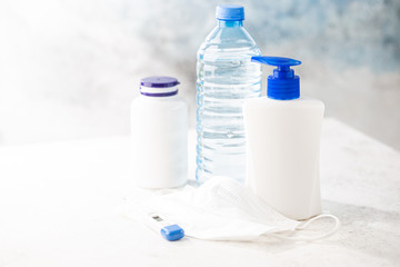 Coronavirus prevention medical surgical masks and hand sanitizer gel for hand hygiene corona virus protection.